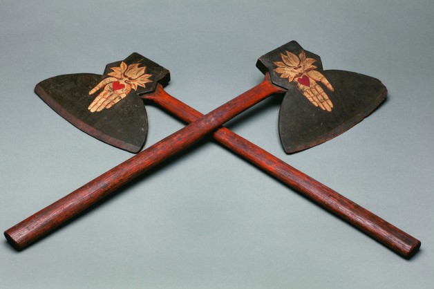 Pair of Odd Fellows axes (1870s), unidentified artist, carved wood with painted heart in hand decoration, each 28 by 8 by 1 in. (courtesy Webb Collection)