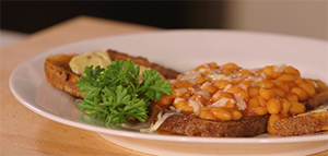 beans on toast, with a garnish of parsley
