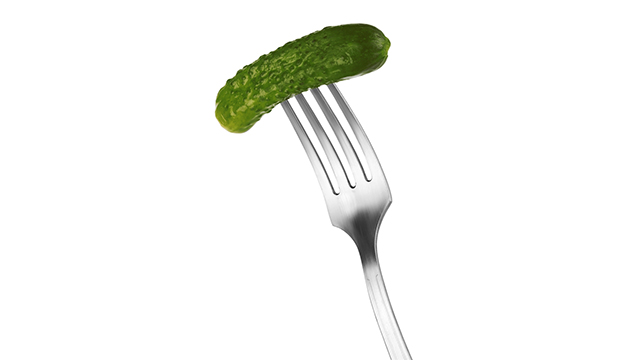 Tiny pickle on a fork