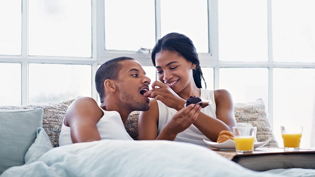 A young couple enjoying their morning at home