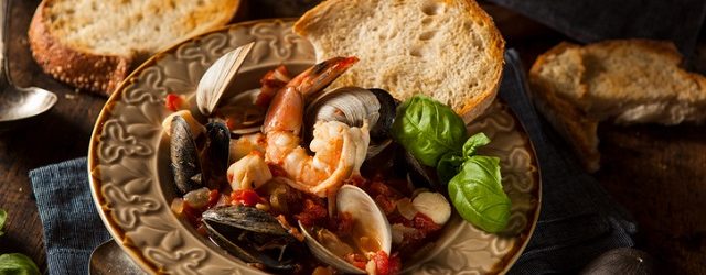 Homemade Italian Seafood Cioppino with Mussels, Clams, and Shrimps