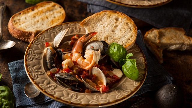 Homemade Italian Seafood Cioppino with Mussels, Clams, and Shrimps