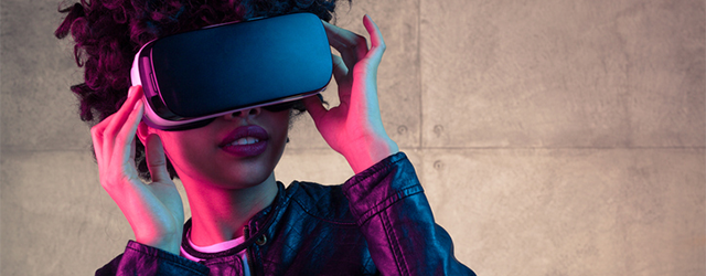 A young woman wearing a virtual reality headset