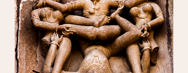 A statue in India depicting group sex. Photo via Flickr user Jack Zalium