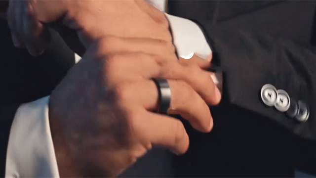 A Motiv fitness tracker ring on a person's finger