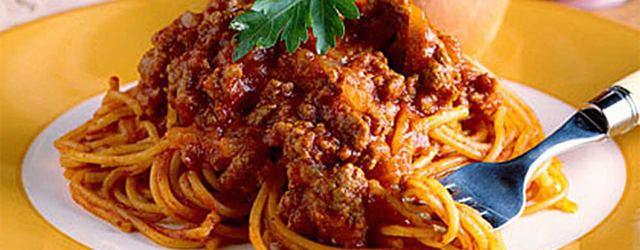 A plate of spaghetti with meat sauce